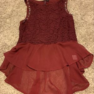 Maroon peplum tank top with bead detailed arms
